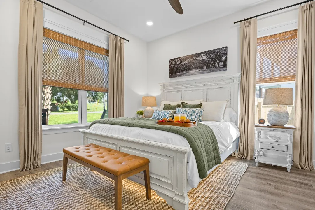 Bedroom 1 with a king bed and a soft blue coverlet